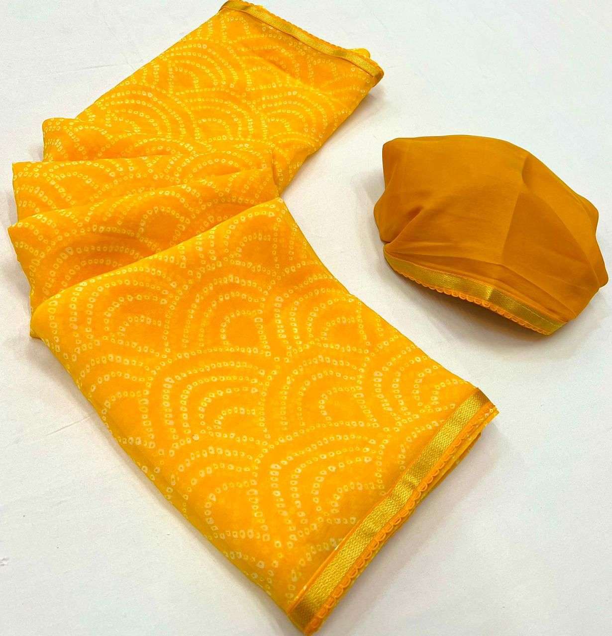 bandhani by kashvi creation georgette fabric designer saree catalogue online wholesaler surat