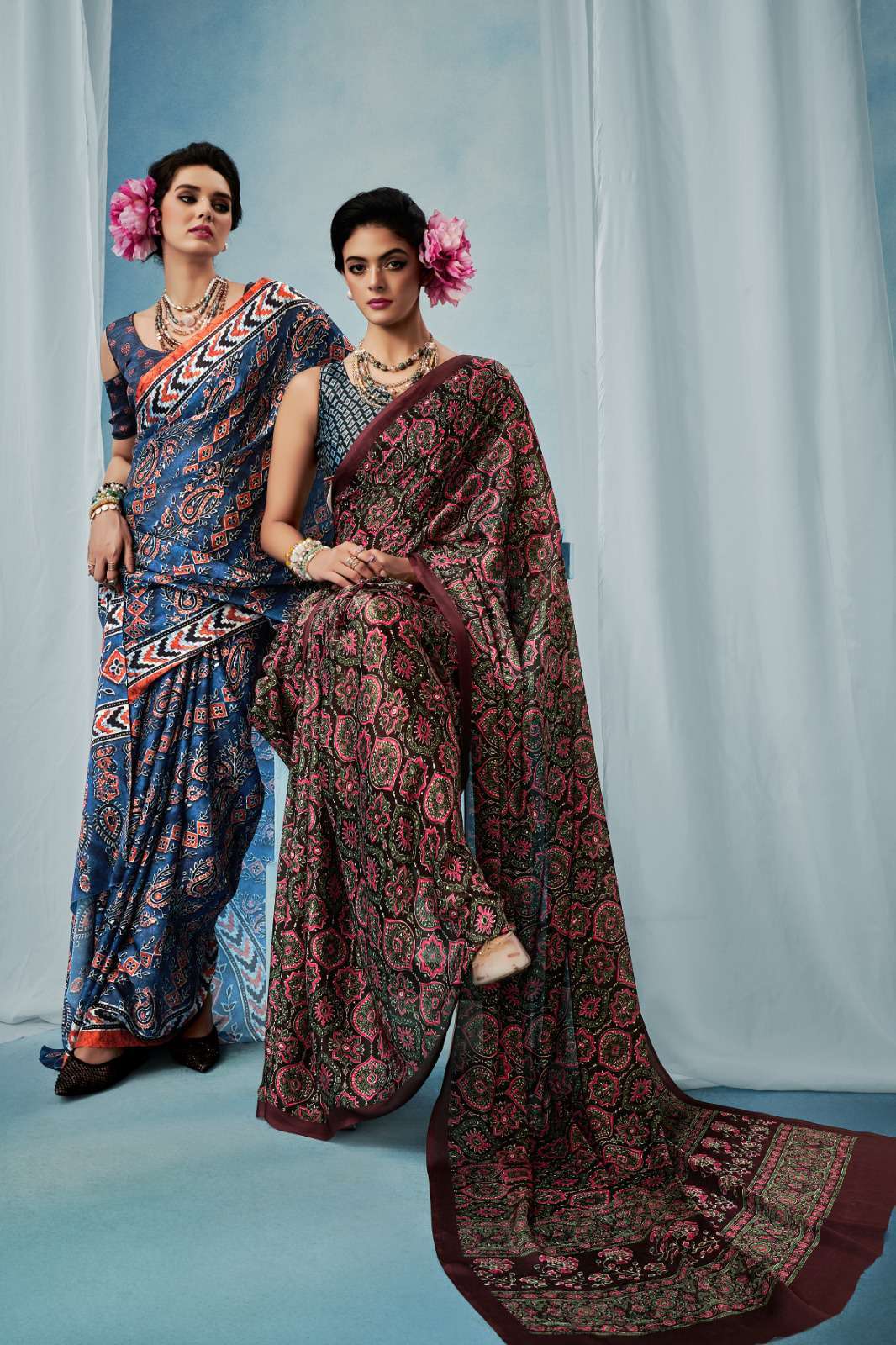 ajrakh silk by sosy best designer party wear satin gerogette saree exporter surat