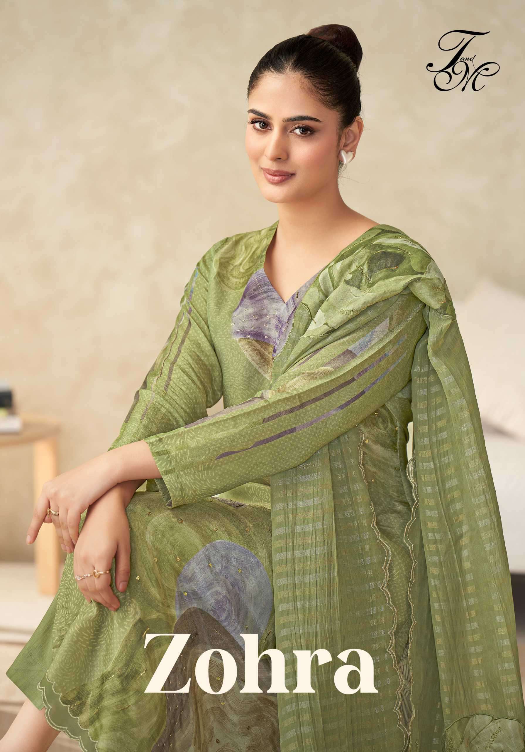 zohra by t&m latest designer simmer tissue embroidered salwar kameez wholesaler surat