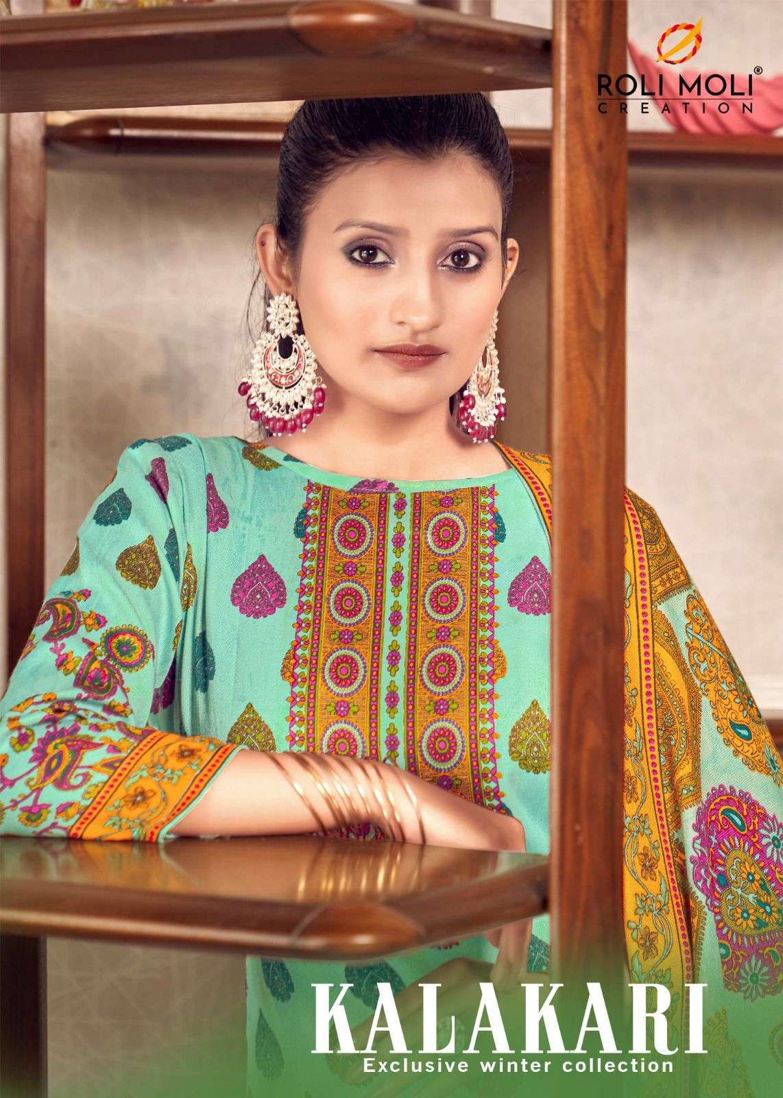 kalakari by roli moli 8001-8008 series pashmina fancy designer salwar kameez wholesale price surat