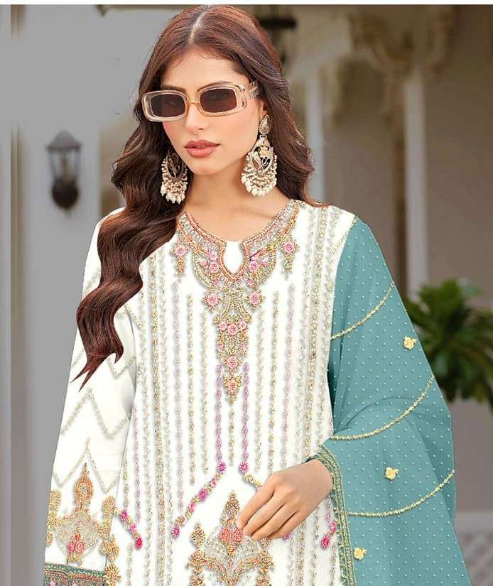 5116 by iznik heavy fancy embroidered organza pakistani suit wholesale price surat