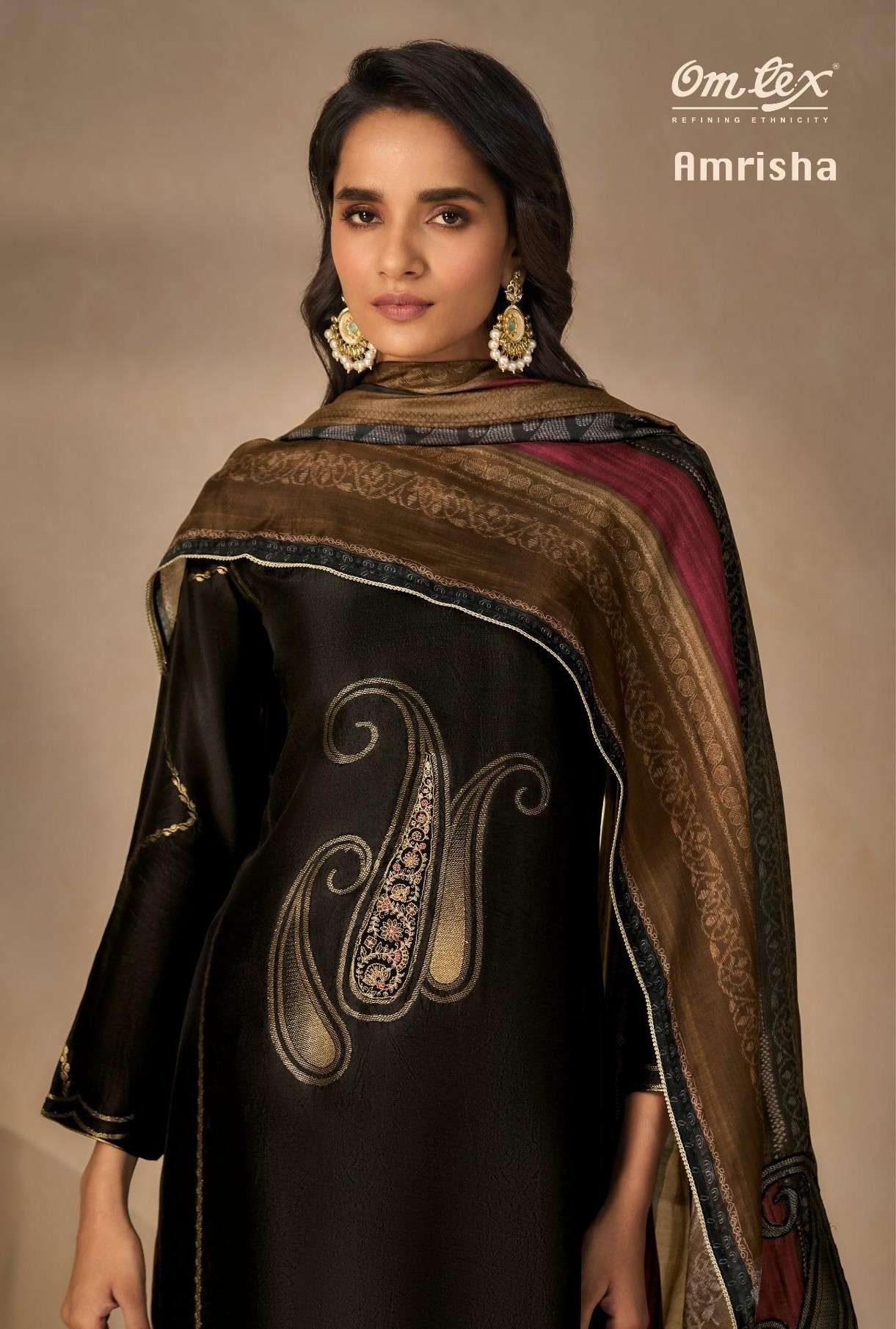 amrisha by omtex silk jacquard fancy embroidered salwar kameez wholesale price surat