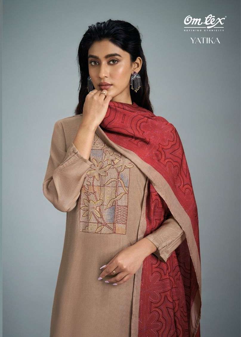 yatika by omtex latest designer embroidered muslin printed suit wholesale price surat